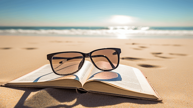 clemence_parisienneries_photo_dun_livre_pose_sur_une_plage._On__94f33f8d-f714-48db-9640-7b38f82da5fd